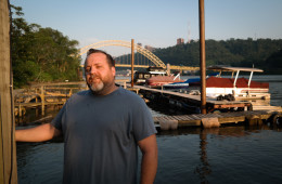 Jason Fleming has found his oasis: Living in a trailer on the Ohio River, care-taking a mom-and-pop marina. Photo: Lou Blouin
