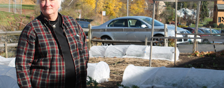 Pat Eagon stands outside the garden near the South Hills Interfaith Ministries food pantry in Pittsburgh. Last year, Eagon helped grow 15,000 pounds of fresh produce for the pantry. Photo: Julie Grant