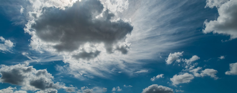 A blue sky with white clouds