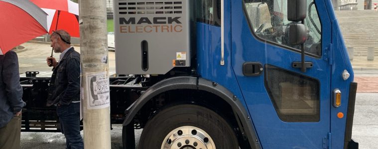 A Mack LR Electric refuse truck