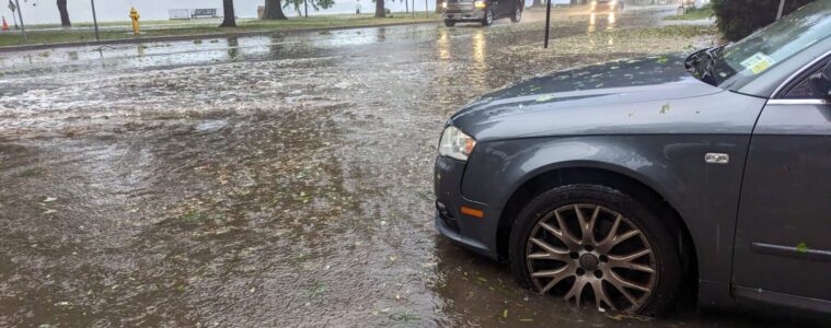 car on flooded street