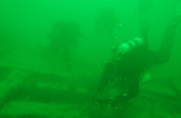 Divers at a shipwreck