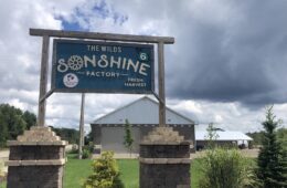 A sign outside of the Wilds Sonshine Factory