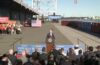 President Biden at a podium in front of reporters at Tioga Marine Terminal in the Port of Philadelphia