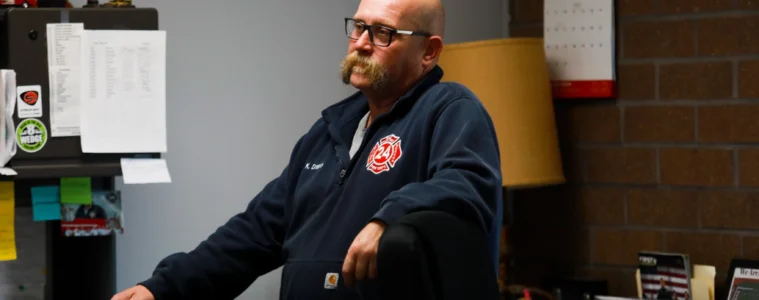 Keith Drabick stands in the firehouse