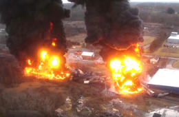 2 huge fires with black smoke seen from above