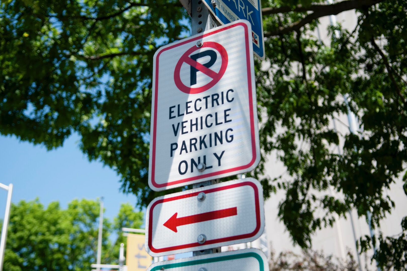 a sign reads "Electric vehicle parking only"