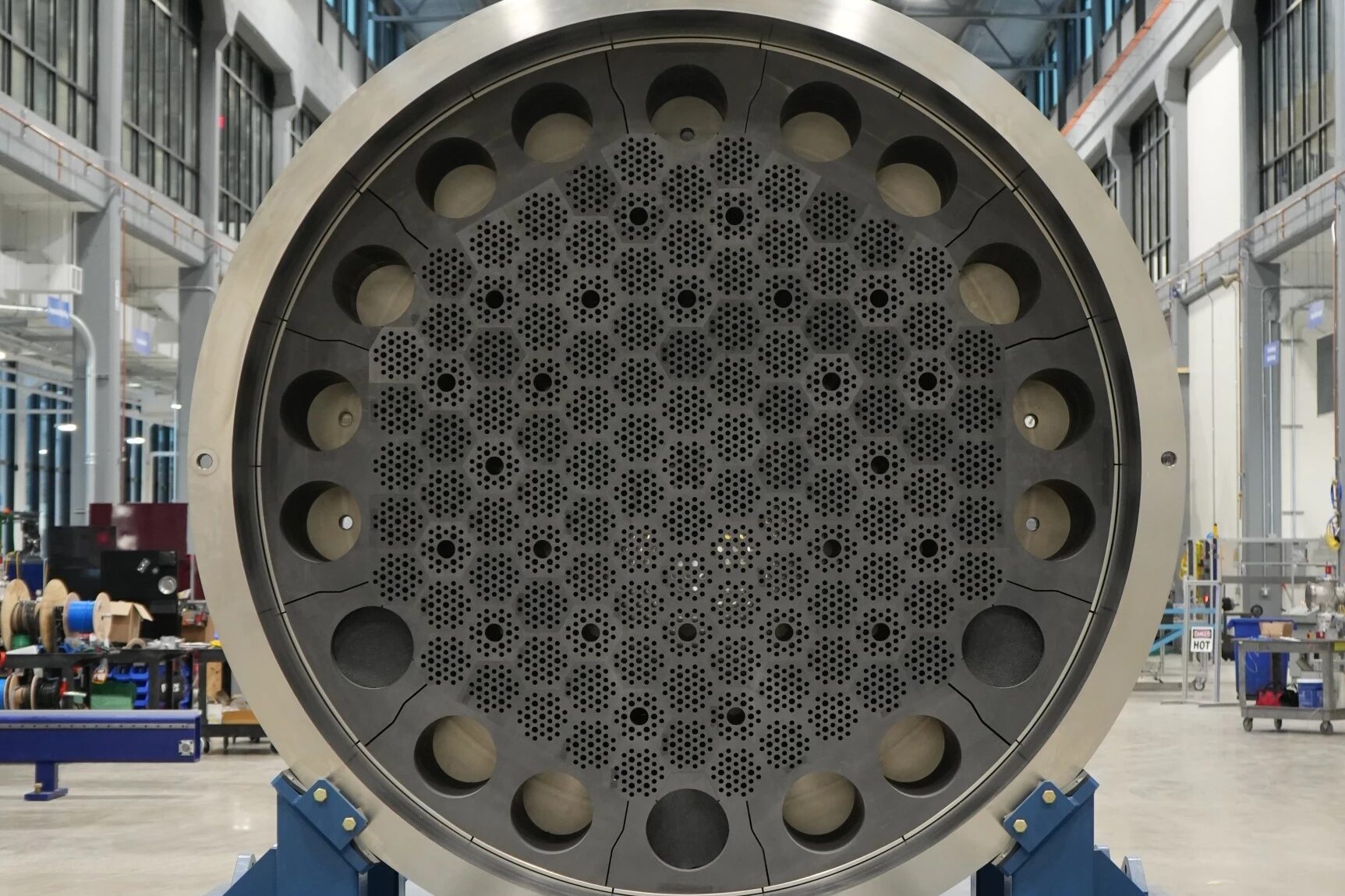 A 12-foot-tall slice into the dark gray core of a model nuclear microreactor looms on the shop floor of the new Westinghouse Electric Company factory 